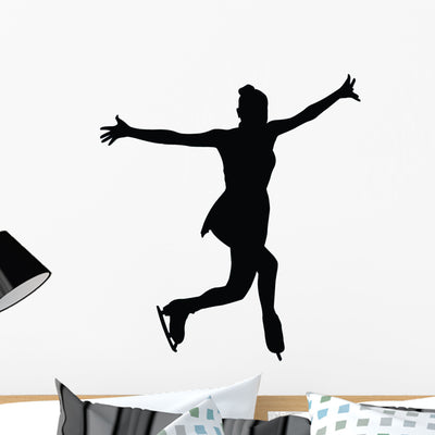 Ice Skating Silhouette Wall Decal shown on a wall
