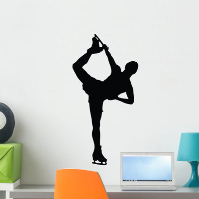 Ice Skating Silhouette Wall Decal shown on a wall