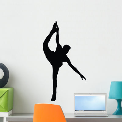 Ice Skating Silhouette Wall Decal shown on a wall