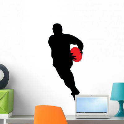 Running Rugby Silhouette Wall Decal shown on a wall