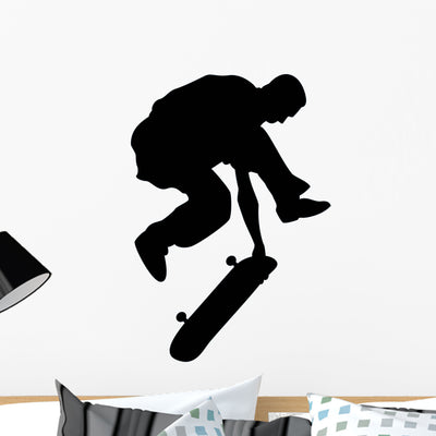 Skate Boarding Silhouette Wall Decal shown on a wall