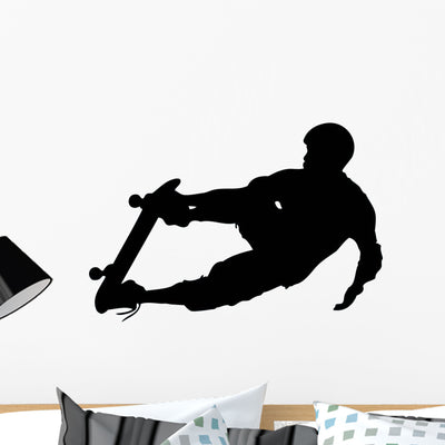 Skate Boarding Silhouette Wall Decal shown on a wall