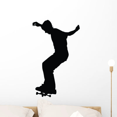 Skateboarding Silhouette Wall Decal shown on a wall