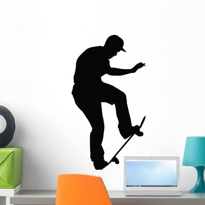 Skateboarding Silhouette Wall Decal shown on a wall
