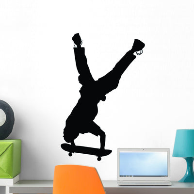 Skateboarding Handstand Wall Decal shown on a wall