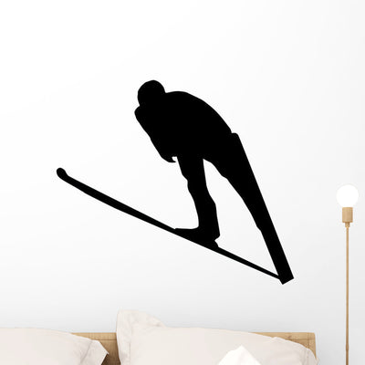 Skiing Silhouette Wall Decal shown on a wall