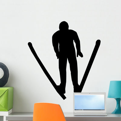 Skiing Silhouette Wall Decal shown on a wall