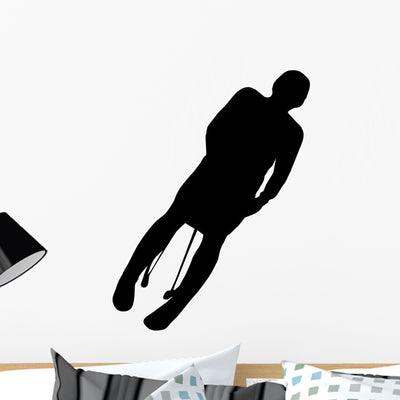Skiing Silhouette Wall Decal shown on a wall