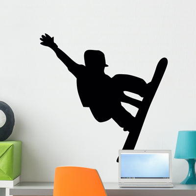 Snowboarding Silhouette Wall Decal shown on a wall