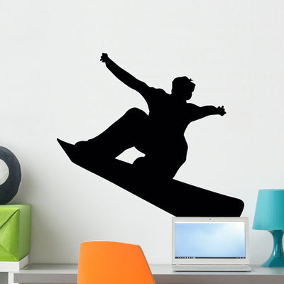 Snowboarding Silhouette Wall Decal shown on a wall