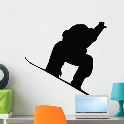 Snowboarding Silhouette Wall Decal shown on a wall