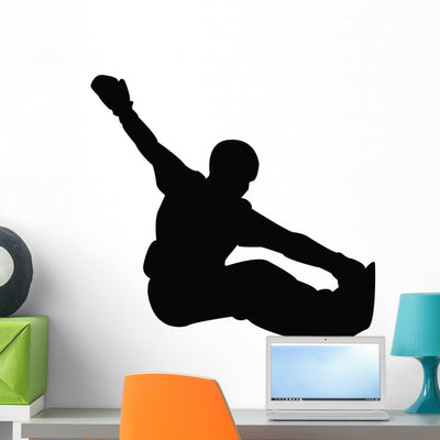 Snowboarding Silhouette Wall Decal shown on a wall