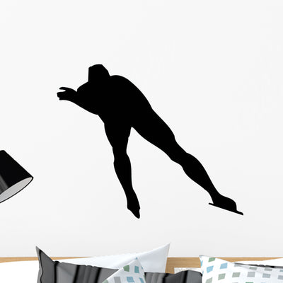 Ice Skater Silhouette Wall Decal shown on a wall