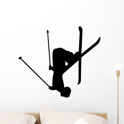 Flipping Skiing Silhouette Wall Decal shown on a wall