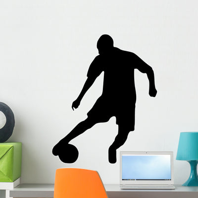 Soccer Silhouette Wall Decal shown on a wall