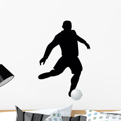 Soccer Silhouette Wall Decal shown on a wall