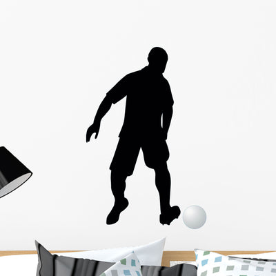 Soccer Silhouette Wall Decal shown on a wall