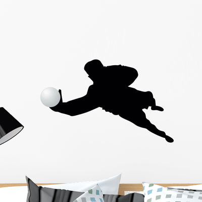Soccer Silhouette Wall Decal shown on a wall