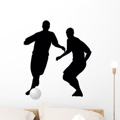 Soccer Silhouette Wall Decal shown on a wall