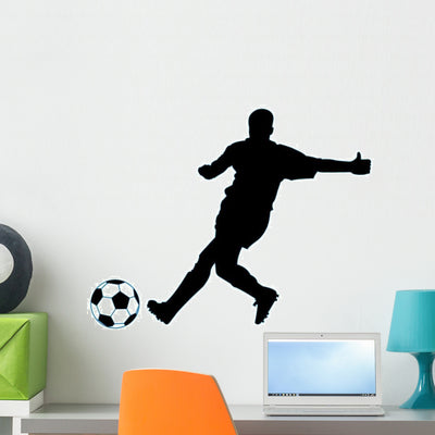 Soccer Silhouette Wall Decal shown on a wall