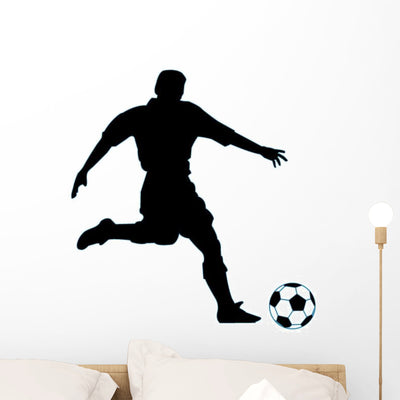 Soccer Silhouette Wall Decal shown on a wall