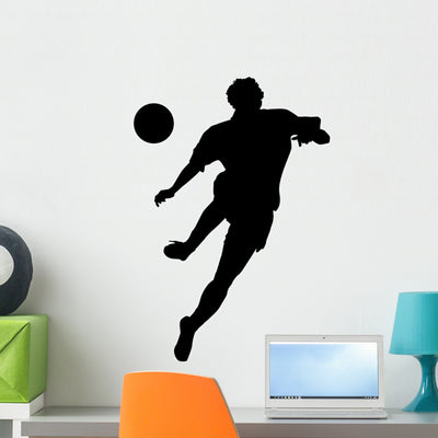 Soccer Silhouette Wall Decal shown on a wall