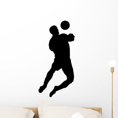 Soccer Silhouette Wall Decal shown on a wall