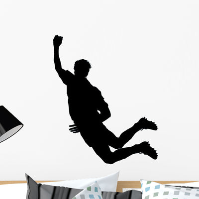 Soccer Silhouette Wall Decal shown on a wall