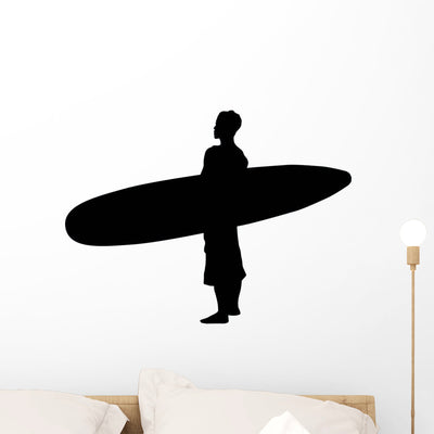 Surfing Surfer Silhouette Wall Decal shown on a wall