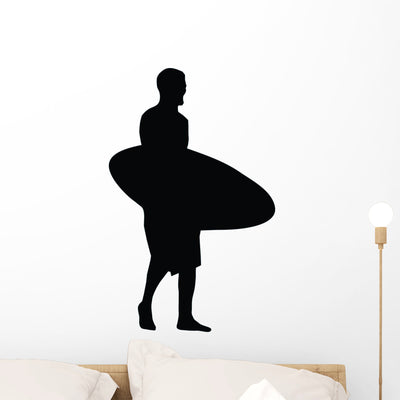 Surfing Silhouette Wall Decal shown on a wall
