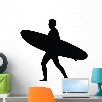 Surfing Silhouette Wall Decal shown on a wall