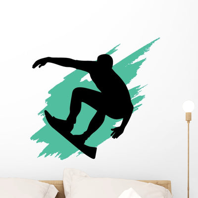 Surfing Silhouette Teal Wave Wall Decal shown on a wall