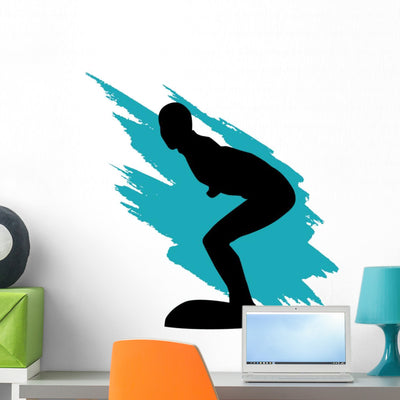 Surfer Silhouette Teal Wave Wall Decal shown on a wall