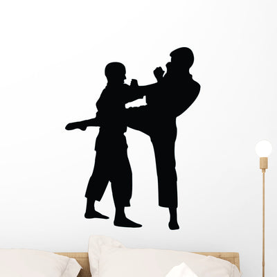 Tae Kwon Do Silhouette Wall Decal shown on a wall