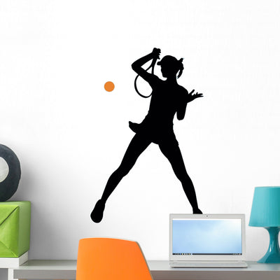 Female Tennis Silhouette Wall Decal shown on a wall