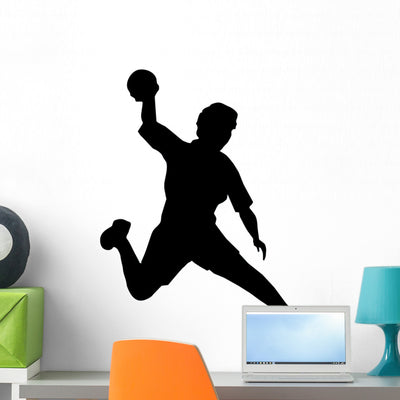 Volley Ball Silhouette Wall Decal shown on a wall