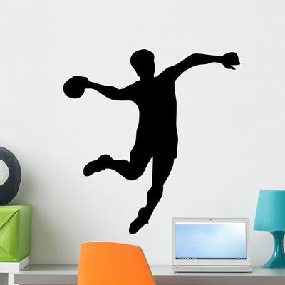 Volley Ball Silhouette Wall Decal shown on a wall