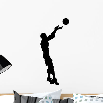 Volley Ball Silhouette Wall Decal shown on a wall
