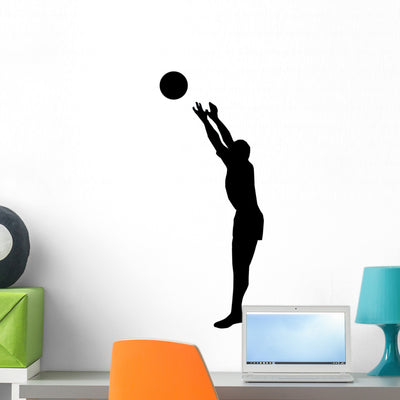 Volley Ball Silhouette Wall Decal shown on a wall