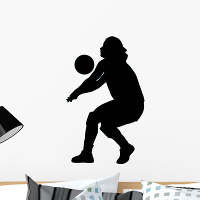 Volley Ball Silhouette Wall Decal shown on a wall