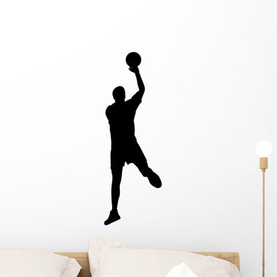 Volley Ball Silhouette Wall Decal shown on a wall
