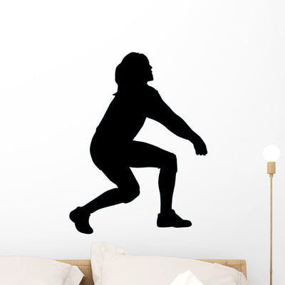 Volley Ball Silhouette Wall Decal shown on a wall