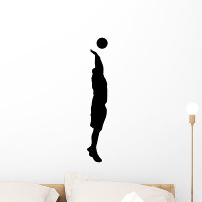 Volley Ball Silhouette Wall Decal shown on a wall