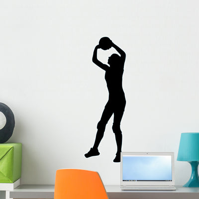 Volley Ball Silhouette Wall Decal shown on a wall