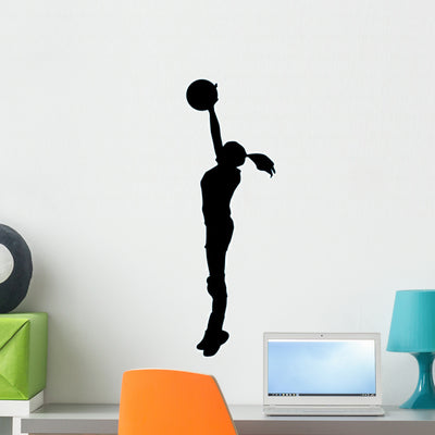 Volley Ball Silhouette Wall Decal shown on a wall