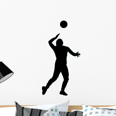 Volley Ball Silhouette Wall Decal shown on a wall