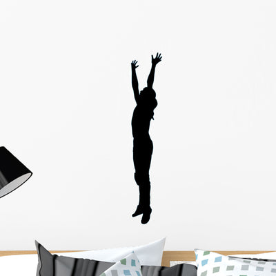 Volley Ball Silhouette Wall Decal shown on a wall