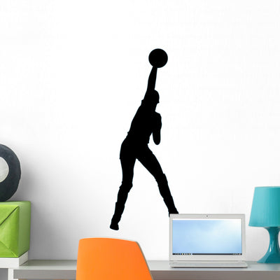 Volley Ball Silhouette Wall Decal shown on a wall
