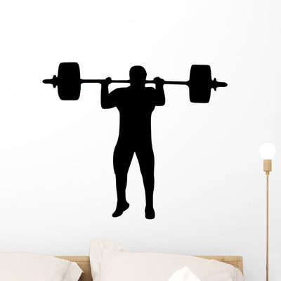 Weight Lifting Silhouette Wall Decal shown on a wall