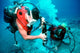 Divers Work to Repair Wall Decal